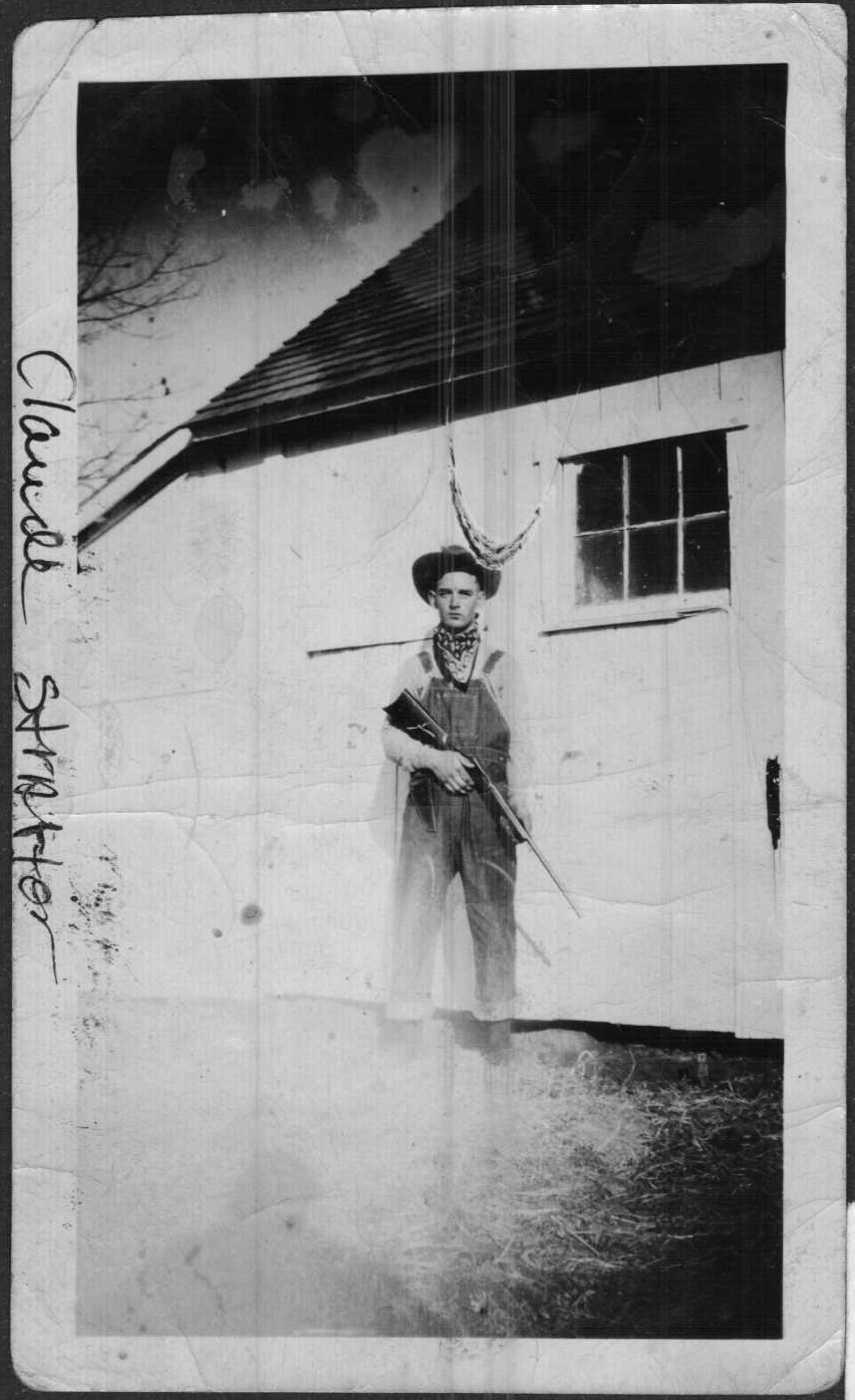 younger with rifle